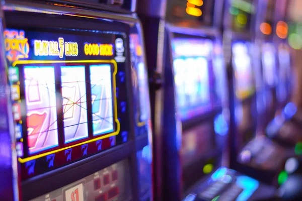 Mobile phone displaying live roulette table with spinning wheel and betting options